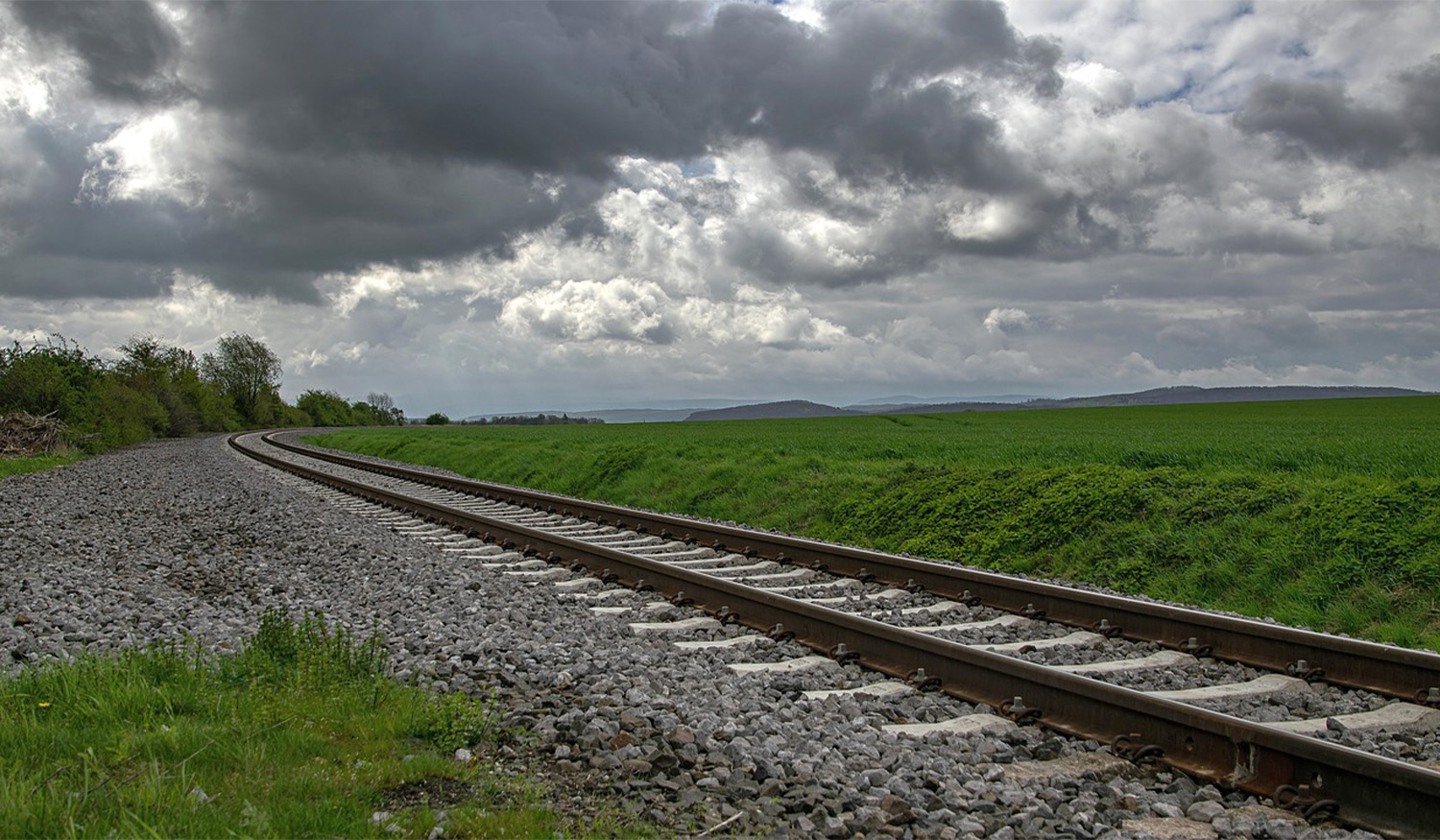 Train tracks on stormy day